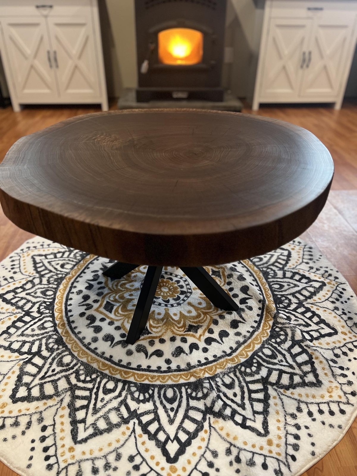 Cookie Coffee Table with natural wood grain and black legs